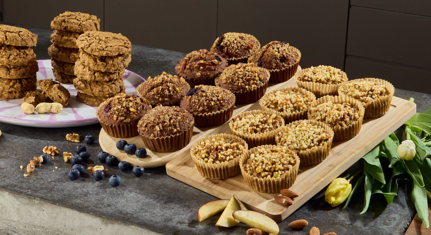 Close-up of muffins and cookies snacks displayed on a plate.