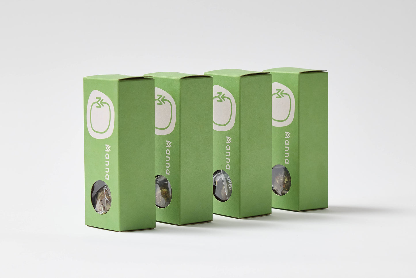 Energy balls packaging stand upright in a row.