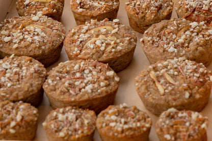 Apple and almond muffin lined in a tray