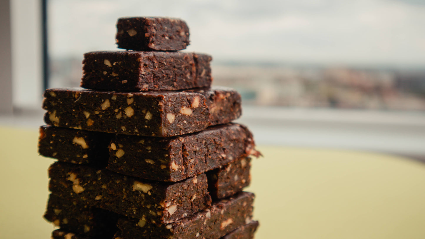 Stack of dense, square hazelnut chai brownies